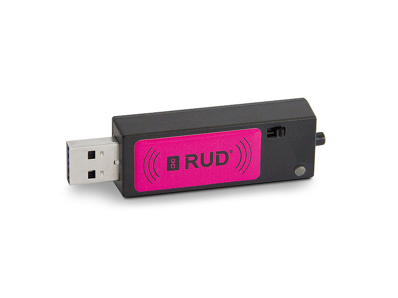 RUD USB-Reader mit pinkem Label zur berührungslosen Auslesung von RFID-Transpondern.