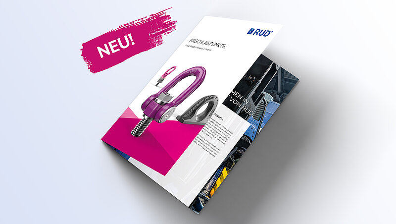 Produktkatalog für Anschlagpunkte von RUD, mit einem neuen, violetten Anschlagpunkt-Design und dem Hinweis 'NEU!' in pink.