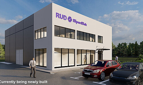 Firmengebäude von RUD SpanSet d.o.o. in Belgrad mit Firmenfahrzeugen im Vordergrund.