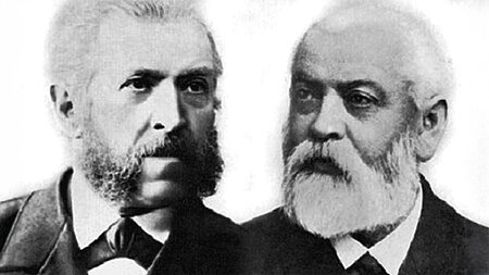 Schwarz-Weiß-Porträt zweier älterer Männer mit Vollbart, Gründer der Otto-Rieger-Stiftung.